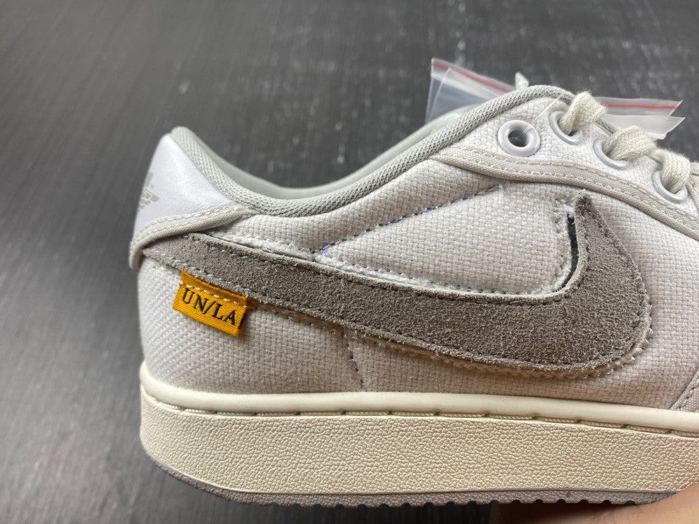 Air Jordan 1 Retro AJKO Low Union White Canvas