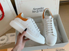 Alexander McQueen Women's White / Orange Sneaker